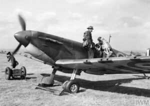 The CO of No. 66 Squadron, Sqn Ldr Rupert Leigh, climbs into his Spitfire Mk I, R6800 LZ-N, at Gravesend, September 1940.